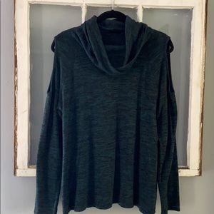 Cold shoulder turtle neck shirt.